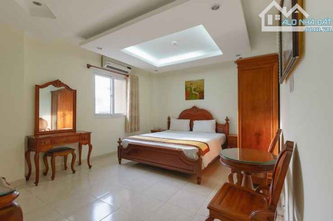 Khách sạn tiêu chuẩn 3 sao TRẦN THỊ NGHĨ  Gò Vấp gần 30 phòng hầm 6 lầu (9x22m) giá 37 tỷ - 1