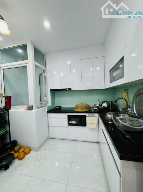 Bán nhà phố Lương Định Của, Đống Đa, ô tô đỗ cửa, ở ngay 5 tầng 45m2 giá 15 tỷ - 1