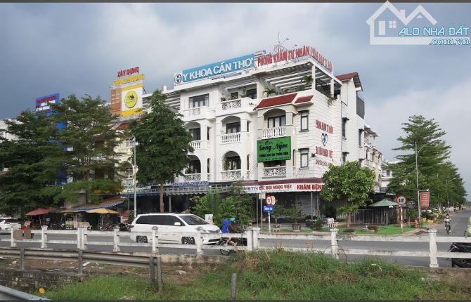 NHÀ GÓC 3 LẦU MẶT TIỀN QUỐC LỘ 1A TP CẦN THƠ