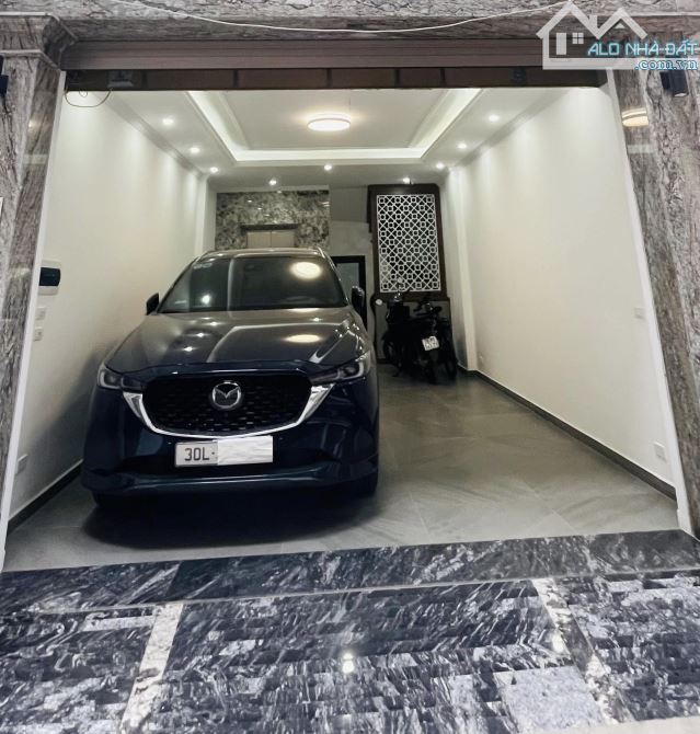 Phùng Chí Kiên, ô tô vào nhà, thang máy, kinh doanh, văn phòng, 7 tầng, 52m2, 18 tỷ