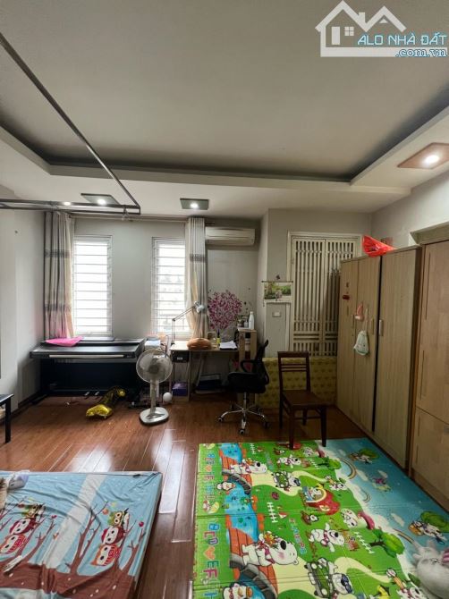 Nguyễn Chí Thanh 85m2*5T MT5m 24 tỷ Đống Đa Mặt ngõ thông KD - ôtô tránh gara 2 thoáng - 1