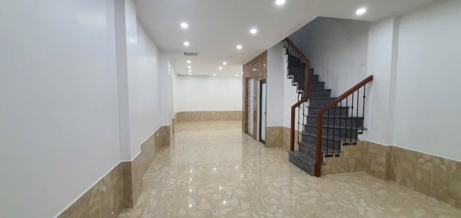 TOÀ NHÀ VĂN PHÒNG KẾT HỢP Ở MẶT PHỐ NGUYỄN XIÊN 8 TẦNG THANG MÁY, VỈA HÈ RỘNG, KD ĐẮC ĐỊA. - 2