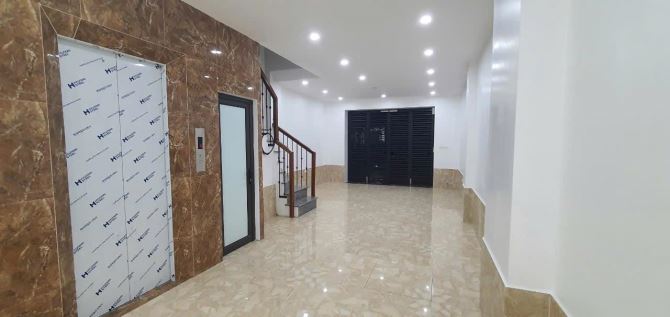TOÀ NHÀ VĂN PHÒNG KẾT HỢP Ở MẶT PHỐ NGUYỄN XIÊN 8 TẦNG THANG MÁY, VỈA HÈ RỘNG, KD ĐẮC ĐỊA. - 4