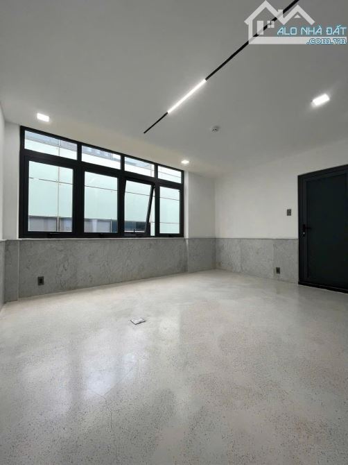 Nhà 4.2x20m, trệt 5 lầu thang máy ngay cầu Ba Son Tôn Đức Thắng 32 tỷ - 2