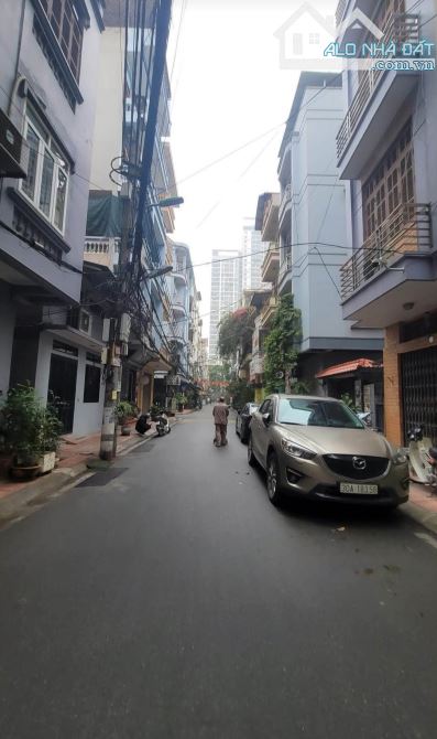 BÁN NHÀ  PHỐ TRẦN ĐĂNG NINH – 2 Ô TÔ TRÁNH – 2 THOÁNG TRƯỚC SAU – 56M - MT 5.5M - KINH DOA