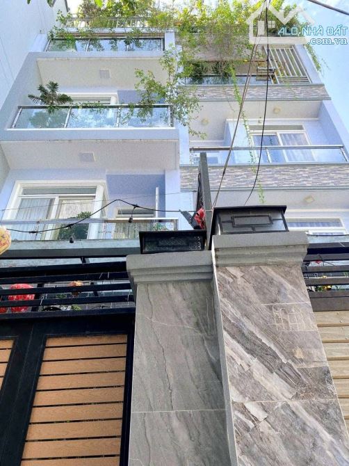 Bán nhà hẻm ô tô 4 tầng 103m2 có thang máy ngay CMT8 quận 10