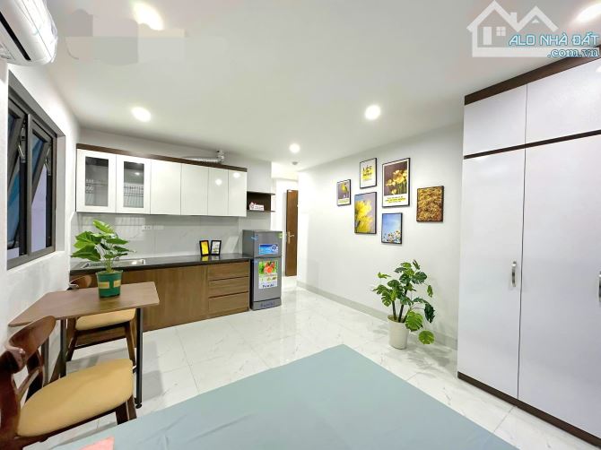 Bán tòa nhà 35P DT 180m2 x 9T Nguyễn Ngọc Vũ Cầu Giấy ô tô vào nhà giá tốt - 2