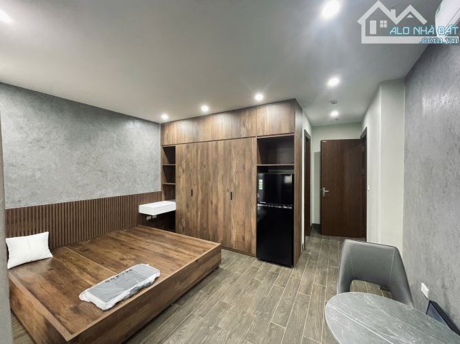 Bán toà CHDV Kim Đồng 60m2*6T thang máy 10PN DT720tr/năm gần ĐH KTQD, PCCC, oto