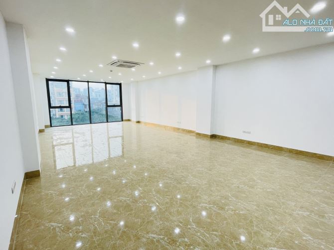 Cho thuê tòa nhà Nguyên Hồng, Đống Đa 80 mét 8 tầng thông sàn thang máy - 1