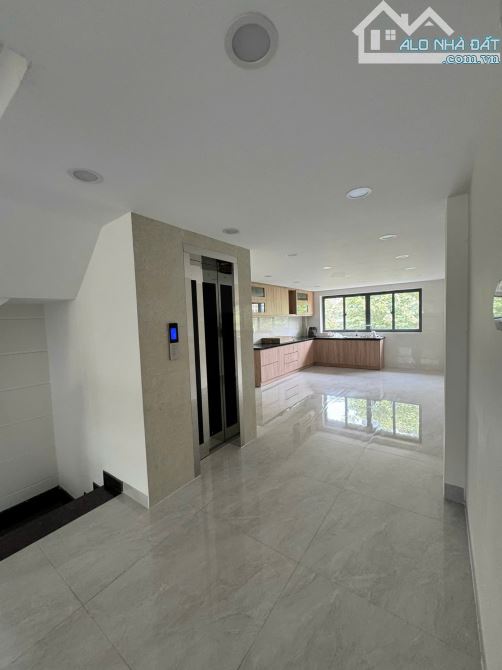 NHÀ BÁN 2 MẶT TIỀN TRƯỚC SAU ĐƯỜNG CHỢ LỚN P11 Q6 (4X18) HẦM 5 LẦU THANG MÁY. CHỈ 20 TỶ - 15