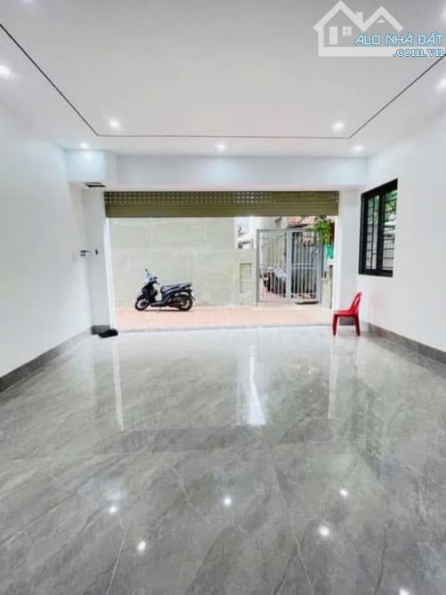 NHÀ ĐẸP LUNG LINH -Ô TÔ VÀO NHÀ -NGÕ THÔNG KINH DOANH -TƯ ĐÌNH 76m2 -7 TẦNG THANG MÁY - 2