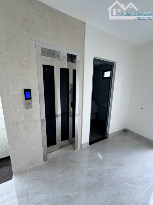 NHÀ BÁN 2 MẶT TIỀN TRƯỚC SAU ĐƯỜNG CHỢ LỚN P11 Q6 (4X18) HẦM 5 LẦU THANG MÁY. CHỈ 20 TỶ - 9