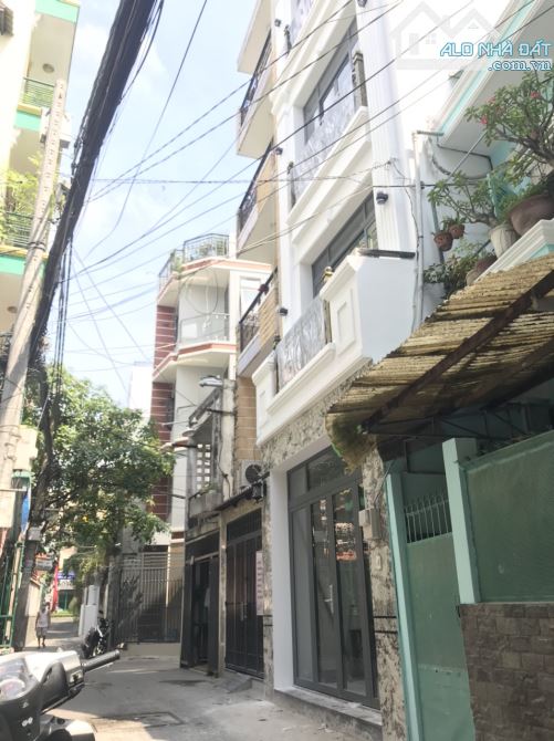 Ngay mặt tiền Đinh Bộ Lĩnh! Bán nhà (4,5x18m) HXH tránh nhau Bình Thạnh, 6pn7wc giá 14 tỷ