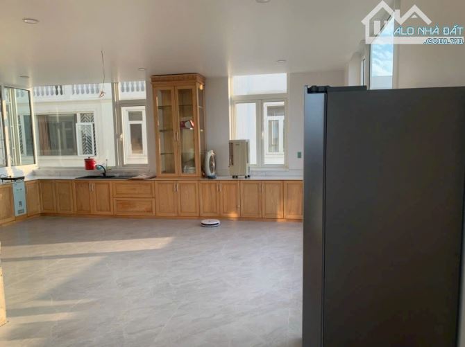 Nhà 4 tầng Phú Mỹ An 216m2 lô góc 3 mặt thoáng - 2