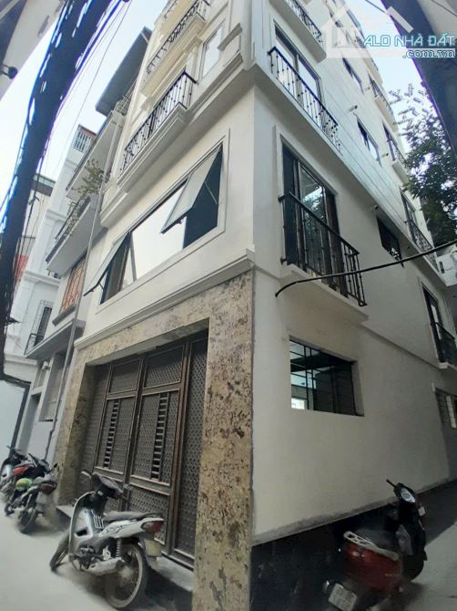 Bán gấp nhà Đội Cấn 56m2, 6 tầng, 12.9 tỷ - Nhà đẹp, lô góc, gần phố, ngõ thông kinh doanh