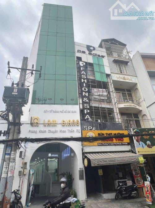 Bán Building 190 HUỲNH VĂN BÁNH, PN. Dt:  4,41 x25 nh 8.4m, Kc: hầm, 7 tầng ST. Gía: 55 ty