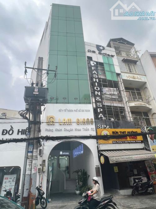 Bán Building 190 HUỲNH VĂN BÁNH, PN. Dt:  4,41 x25 nh 8.4m, Kc: hầm, 7 tầng ST. Gía: 55 ty - 1