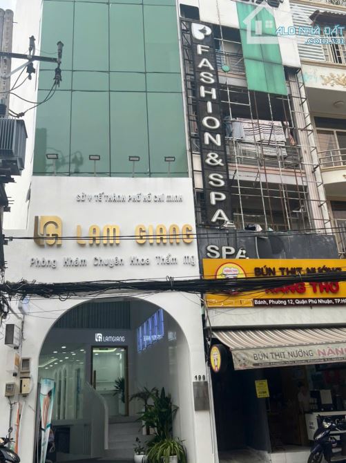 Bán Building 190 HUỲNH VĂN BÁNH, PN. Dt:  4,41 x25 nh 8.4m, Kc: hầm, 7 tầng ST. Gía: 55 ty - 2