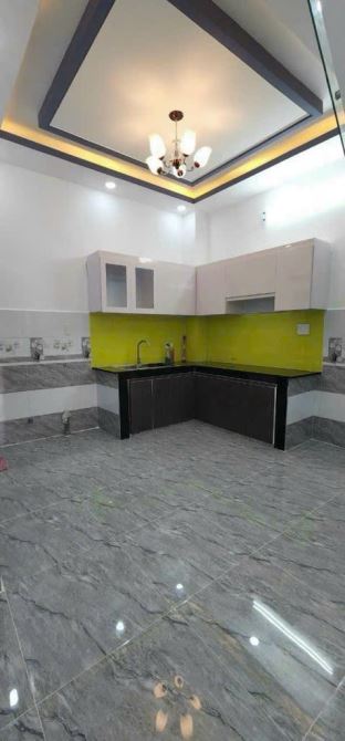 NHÀ CĂN GÓC 2 MẶT TIỀN 50M2 - TRUNG TÂM QUẬN 7 - 5 PHÚT DI CHUYỂN ĐẾN TRUNG TÂM CÁC QUẬN - 6