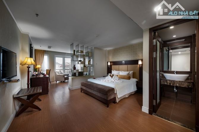 Bán KS Trần Thái Tông, DT 160m2 x 10 tầng, MT 26m, Lô Góc, 4 Ô tô tránh, vỉa hè, Giá 80 tỷ - 4