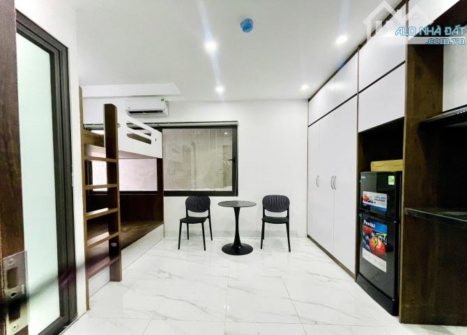 Bán toà nhà CHDV 50m 7T thang máy phố Xã Đàn căn góc 12p khép kín - 1