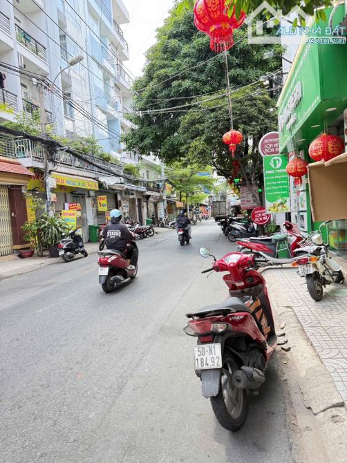 Bán nhà Mặt Tiền Nguyễn Quang Bích. Dt: 6x20m- Gpxd : hầm- 7 tầng- giá 23,9 tỷ