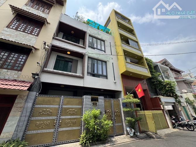 Bán nhà Mặt Tiền Nguyễn Quang Bích. Dt: 6x20m- Gpxd : hầm- 7 tầng- giá 23,9 tỷ - 1