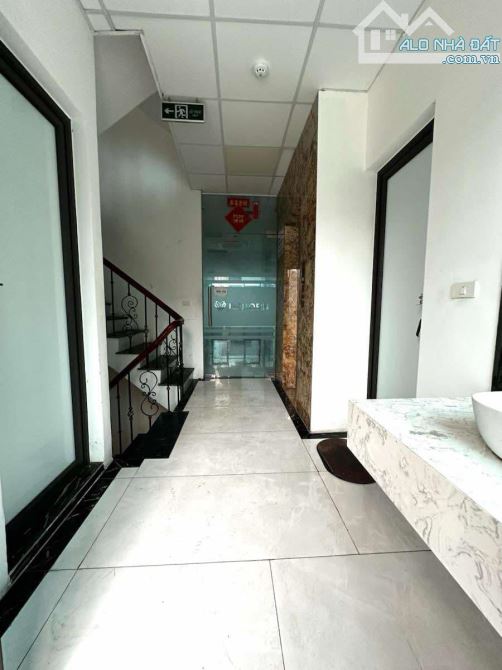 BÁN NHÀ MP TRUNG KÍNH  TÒA BUILDING VĂN PHÒNG 2 MẶT THOÁNG  98m2 7 TẦNG MẶT TIỀN 5M6 - 4