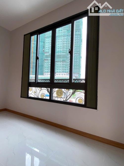 QUẬN 7 BÁN NHÀ XÂY MỚI 2 LẦU GIÁ CHỈ 6.9 TỶ ngay cạnh ngã tư Nguyễn Thị Thập 4x15m - 10