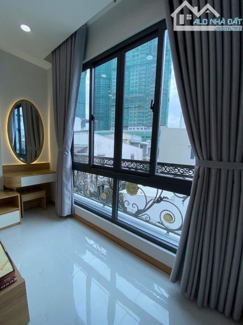 QUẬN 7 BÁN NHÀ XÂY MỚI 2 LẦU GIÁ CHỈ 6.9 TỶ ngay cạnh ngã tư Nguyễn Thị Thập 4x15m - 11