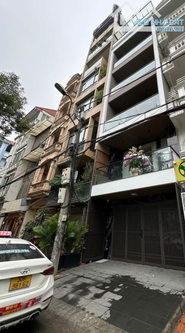 Mặt Hồ Phố Chùa Láng, sau nhà ngõ oto tránh, vỉa hè rộng, 6 tầng thang máy, 65m2.Giá 33 tỷ - 2
