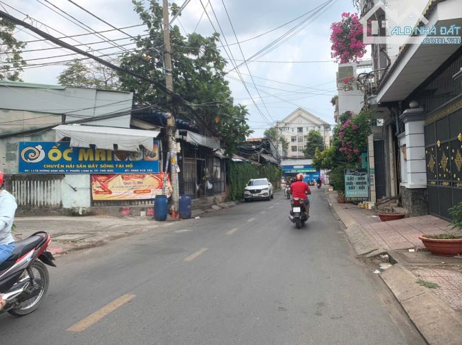 Bán nhà 2 lầu mặt tiền đường 109, Phước Long B, giá 9,7 tỷ/100m2 - 1