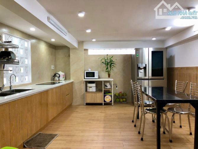 Bán nhà mặt tiền 4 tầng, DT:82m2 ngay Võ Văn Kiệt, P.AnLạc, Q. Bình Tân - 1