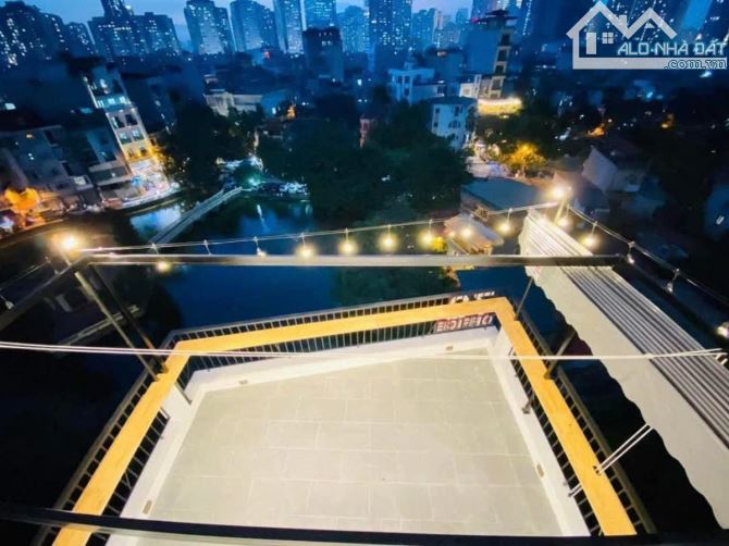 TOÀ VĂN PHÒNG MẶT HỒ QUAN NHÂN: DT 100M2, 8 TẦNG THÔNG SÀN, GIÁ 36 TỶ - 2
