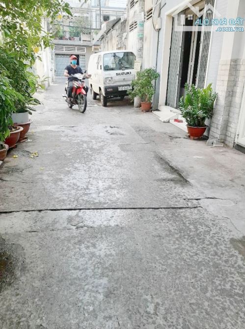 BÙI THỊ XUÂN P1 TÂN BÌNH Ô TÔ NGỦ TRONG NHÀ 108m2 (4*27) 3Pn gần Trường Sa ,chỉ 11 Tỷ Xx