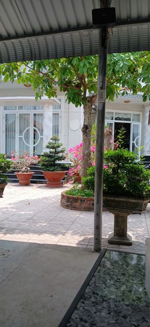 Cần bán Lô đất 2.400 tặng căn BIỆT THỰ SANG TRỌNG sát DT 870 dẫn Cầu Rạch miễu2.TG - 7