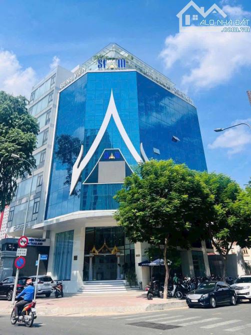 Bán tòa nhà góc 2MT Nguyễn Trãi, P Nguyễn Cư Trinh Quận 1, DT 15 x 30m, HĐT 35.000$/th - 1