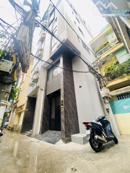 BÁN NHÀ - 11 PHÒNG (1 NGỦ + 1 KHÁCH) - TT ĐỐNG ĐA - LÔ GÓC - 7 TẦNG THANG MÁY - 80M RA PHỐ