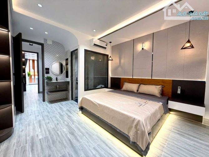 HIẾM !! Cách mặt tiền Võ Thị Nhờ chỉ 10m, ngay Vincom Trần Trọng Cung, hẻm oto, 5 Tầng, Q7 - 1