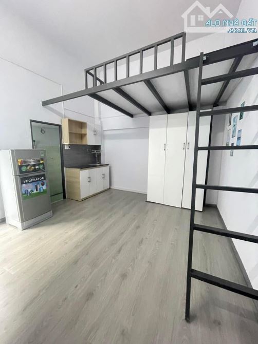 Căn hộ dịch vụ Khu Dân Cư Tân Quy Đông có Hầm, Thang Máy, 5 tầng, 60m2, thu nhập 650triệu