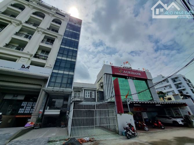 Bán nhà Mặt tiền Nguyễn Văn Linh DT 5,5x18m Quận 7. XD được 1 hầm 7 lầu - 1