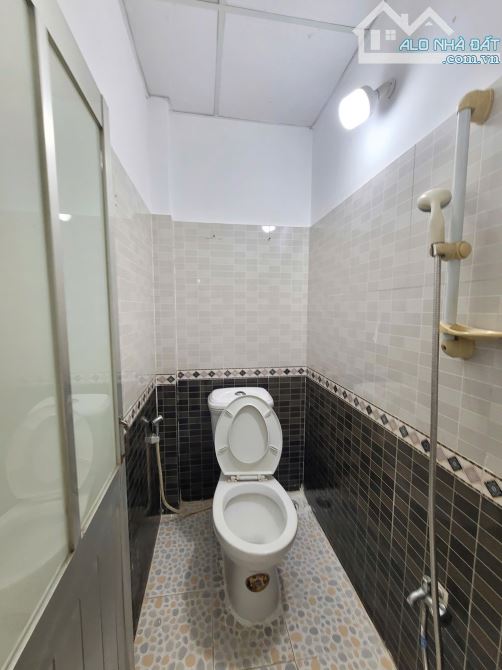 nhà 1 trệt 1 và 3 phòng trọ 100m2 2ty650 TL phía sau KDC gần đường ĐT743 p.Bình Chuẩn - 3