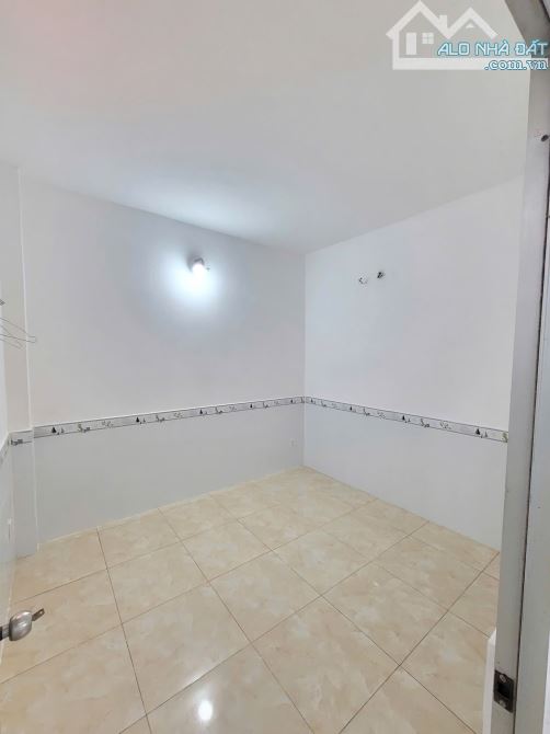 nhà 1 trệt 1 và 3 phòng trọ 100m2 2ty650 TL phía sau KDC gần đường ĐT743 p.Bình Chuẩn - 5