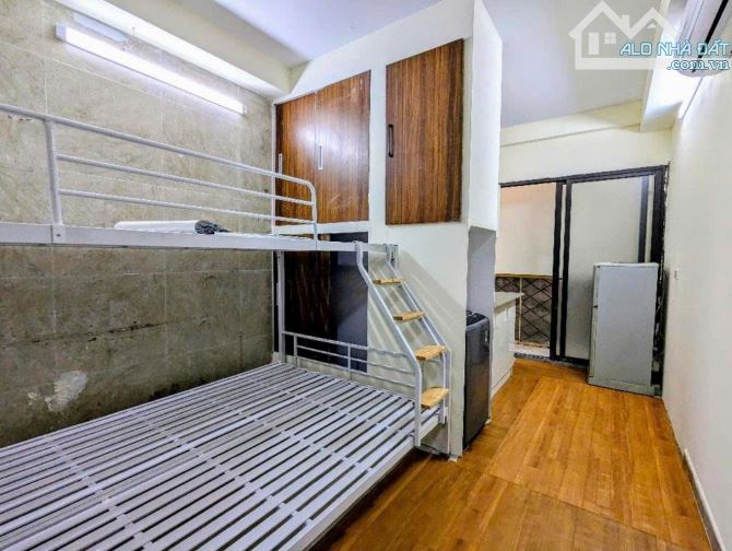 Bán toàn CCMN cao cấp Nguyễn An Ninh, 6 tầng, ô tô đõ cửa, ngõ thông, 11 phòng full - 1