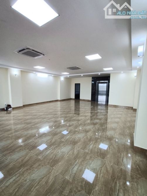 Cho thuê nhà mặt đường 70 165m 5 tầng 1 hầm,MT 8m  thông sàn,thang máy - 2