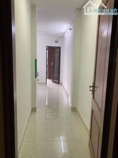 Bán nhà nguyễn văn trỗi 70m2*7T, 11P, cách MP 10M, GIÁ  14,3 tỷ - 2
