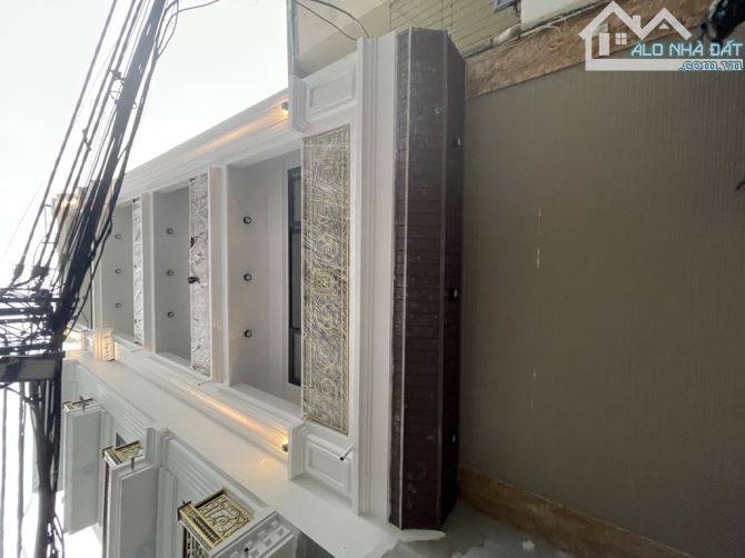 BÁN NHÀ NGUYỄN ĐỨC CẢNH DT 60m2, MT 5m, XÂY MỚI 7 TẦNG THANG MÁY, GA RA Ô TÔ, GIÁ BÁN 15 X
