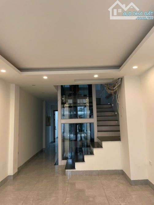 BÁN NHÀ ĐẸP 8 TẦNG PHỐ ĐẶNG THAI MAI, Ô TÔ ĐẬU TRƯỚC NHÀ, VỈA HÈ, DT 86M2, GIÁ 19 TỶ