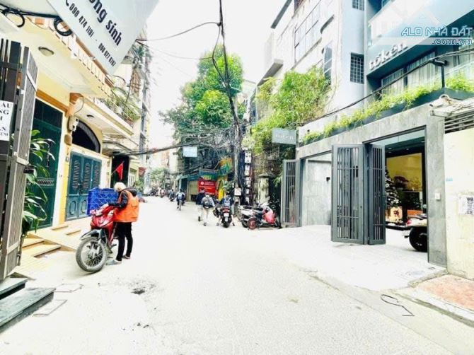 Nhà Mới đẹp 6 Tầng Nguyễn Phúc Lai, Đống Đa Ô Tô, Thang Máy KD 90M2 5.5M Giá 30 Tỷ - 1