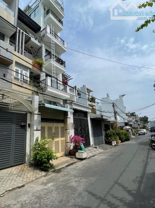Căn hộ dịch vụ full nội thất 11PN 7 tầng dòng tiền 50tr Tân Quy quận 7
